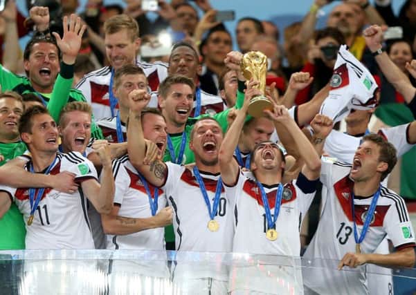 Germany's Philipp Lahm lifts the World Cup..