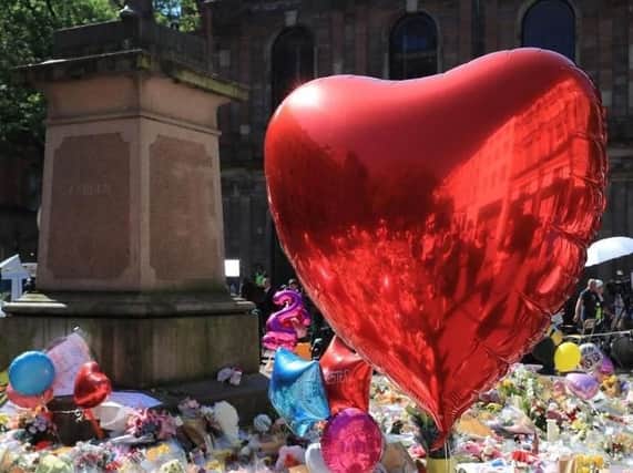 Tributes left after the Manchester bombing last year. PA/Peter Byrne.