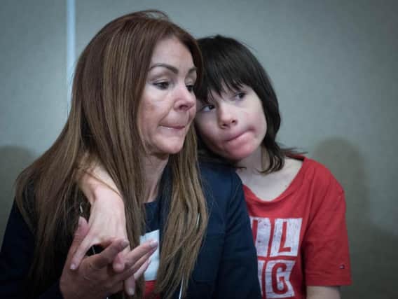 Billy Cauldwell with his mother Charlotte. The severely epileptic child who had his cannabis medicine confiscated by the Home Office will remain in hospital after a string of life-threatening seizures. Photo: PA