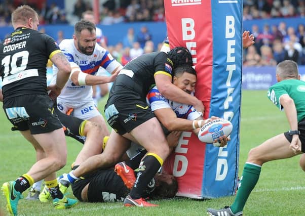 Tinirau Arona scores a try for Wakefield