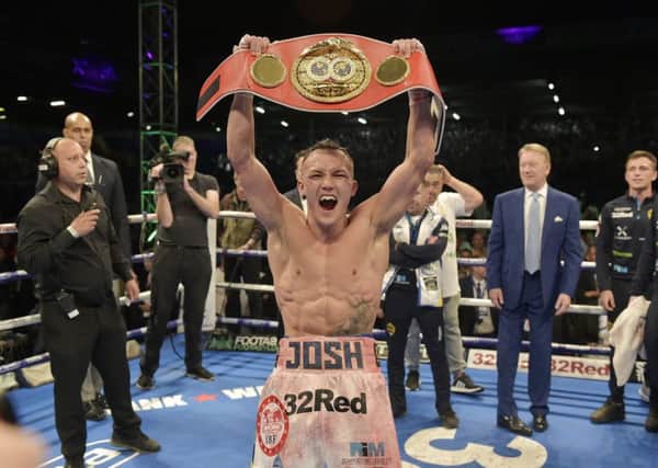 Come and get it: Josh Warrington celebrates beating 
Lee Selby on a split decision. (Picture: Steve Riding)