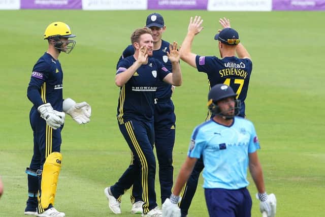 Hampshire's Liam Dawson (centre) celebrates taking the wicket of Yorkshire's Jack Leaning.