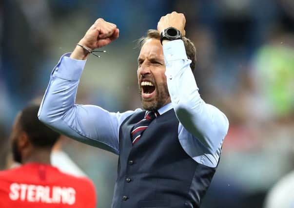 England manager Gareth Southgate celebrates their late win over Tunisia (Picture: Adam Davy/PA Wire).