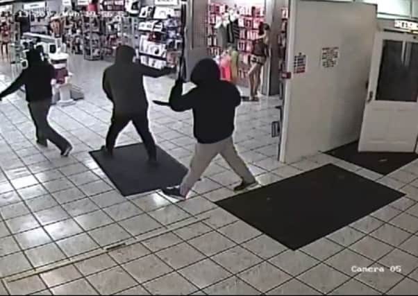 Masked robbers enter Pulse and Cocktails.