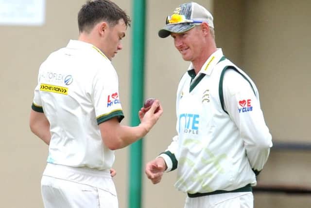 Andy Brewster and former Yorkshire player Andy Hutchinson, who was a late stand-in at Methley when one of the New Farnley players was injured in the warm-up. PIC: Steve Riding