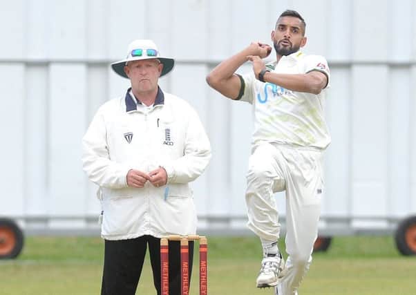 Ajmal Shahzad runs in for New Farnley at Premier Division rivals Methley. PIC: Steve Riding