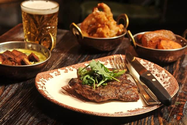 8oz sirloin with sides of triple cooked chips, shredded leaks, onion rings. PIC: Tony Johnson