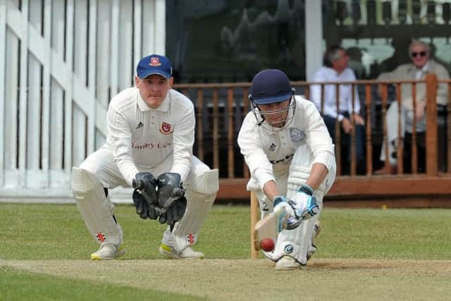 Farsley's Dan Hodgson nudges the ball to leg on his way to a century in his side's convincing win over Cleckheaton. Picture: Tony Johnson.