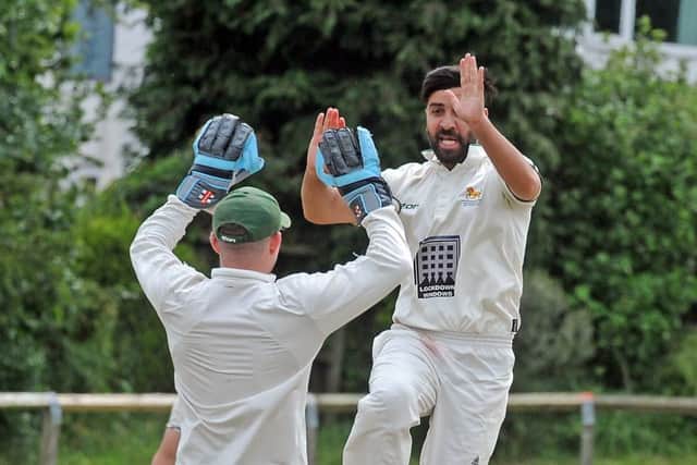 Horsforth's Saj Ali celebrates taking the wicket of Follifoot's Nick Robinson.  Picture:Tony Johnson.