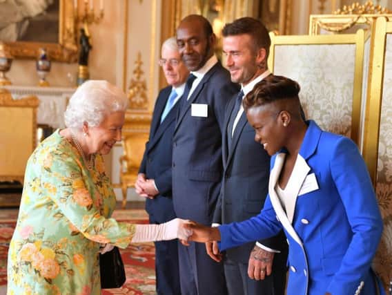 Queen Elizabeth II meets Nicola Adams at Buckingham Palace.  Photo credit: John Stillwell/PA Wire