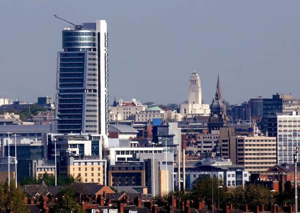 Leeds city centre skyline with Bridgewater Place, the Town Hall, and Leeds University.