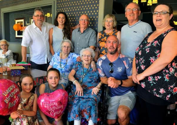 Family celebrate the 95th birthday of twins Lily Poolman and Muriel Stancliffe (in wheelchair)  at The Devon  pub in Leeds.