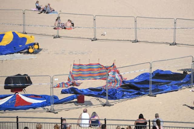 The scene on Gorleston beach in Norfolk, after a young girl died after reportedly being thrown from a bouncy castle. PIC: PA