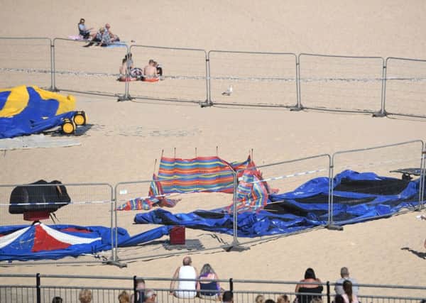 The scene on Gorleston beach in Norfolk, after a young girl died after reportedly being thrown from a bouncy castle. PIC: PA