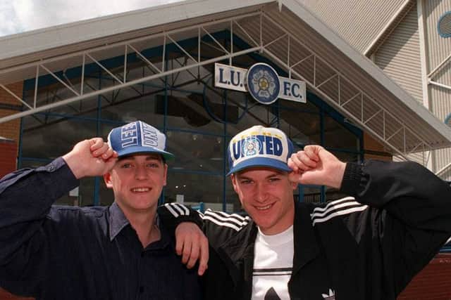 1990: Leeds United stars Mark Ford and Andy Couzens outside the new club souvenir shop.