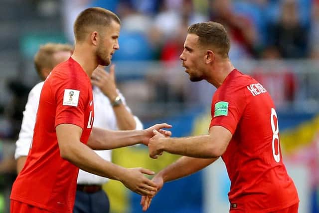 England's Eric Dier (left) is substituted on for England's Jordan Henderson (right) during the FIFA World Cup quarter-final with Sweden (Picture: PA)