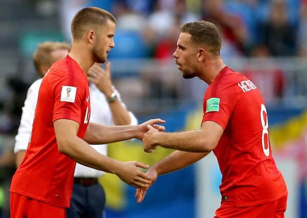 England's Eric Dier (left) is substituted on for England's Jordan Henderson (right) during the FIFA World Cup quarter-final with Sweden (Picture: PA)