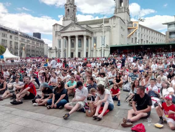 England fans wait for kick-off in Millennium Square
