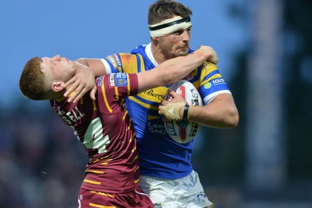 Stevie Ward pushes off Oliver Russell.
Leeds Rhinos v Huddersfield Giants, BetFred SuperLeague.  Emerald Headingley Stadium.
8 June 2018.  Picture Bruce Rollinson