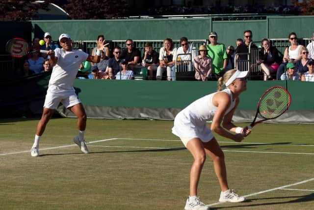Jay Clarke and Harriet Dart in action in the doubles.
