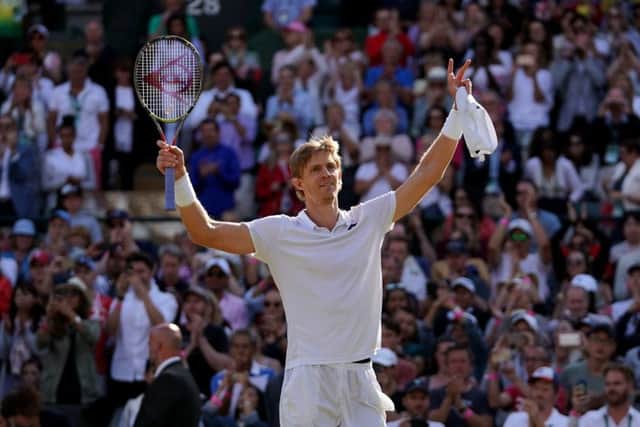 Kevin Anderson celebrates his win against Roger Federer.