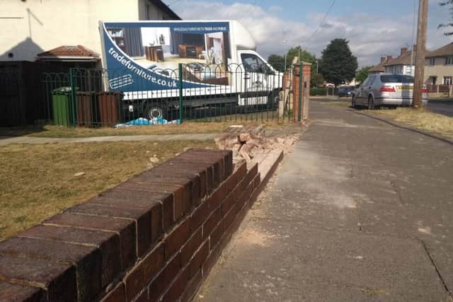 The demolished wall on Elizabeth Drive.