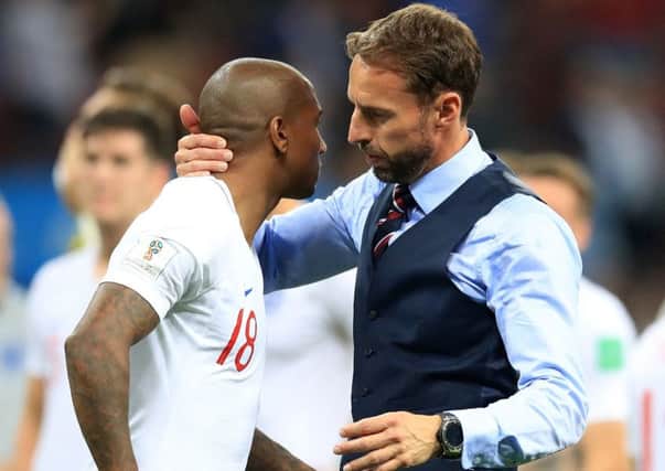 England manager Gareth Southgate embraces Ashley Young after the FIFA World Cup semi-finae Luzhniki Stadium, Moscow (Picture: Adam Davy/PA Wire)