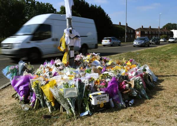 Floral tributes at the car crash site in Broadway, Horsforth.
4th July 2018.
Picture Jonathan Gawthorpe