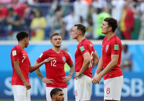 England's players show their disappointment after losing to Belgium in St petersburg on Saturday. Picture: Aaron Chown/PA