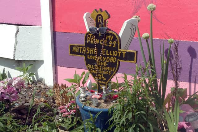 A cross in the garden made by Natasha's grandfather Tony, pictured in 2011.