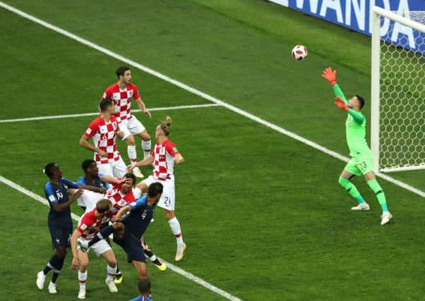 Croatia's Mario Mandzukic (bottom second right) scores an own goal during during Sunday's finall at the Luzhniki Stadium in Moscow. Picture: Aaron Chown/PA