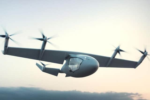 Photo issued by Rolls-Royce PLC of a flying taxi concept which has been unveiled by engine maker. The hybrid vehicle could transport five passengers at speeds of 250mph for up to 500 miles without being recharged. PA