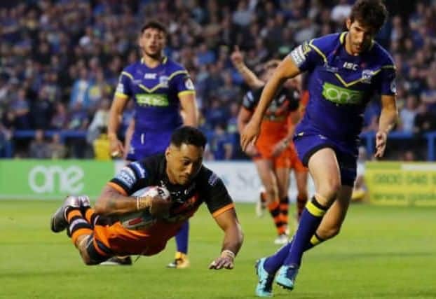 Quentin Laulu-Togaga'e goes over for a try on his Castleford Tigers debut versus Warrington.