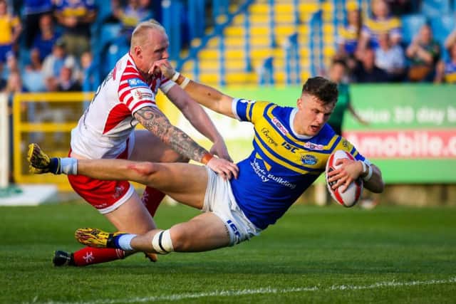 Leeds Rhinos' joint leading try scorer Ash Handley touching down against fellow Ladbrokes Challenge Cup quarter-finalists Leigh Centurions. PIC: Alex Whitehead/SWpix.com