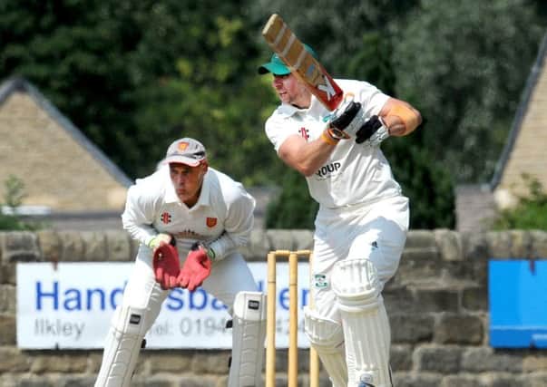 Jamie Pickering who scored 108 goes on the attack with Ben Morley .