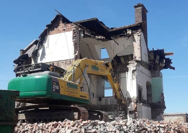 Demolition work at the building that previously occupied the Regent Terrace site.