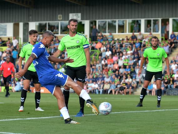Kemar Roofe claims the first goal in Leeds United's win over Forest Green.