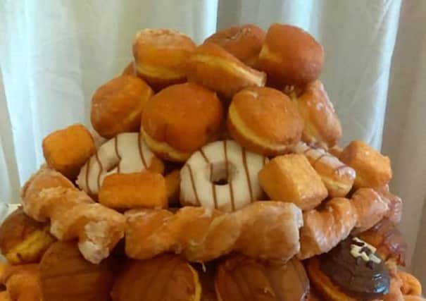 Gregg's donut tower for dessert on offer to the wedding guests.  PIC: SWNS