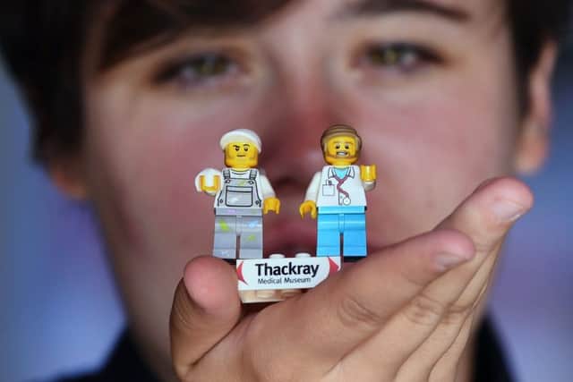FOUNDATIONS: Lego Build Co-ordinator Katie Clark was one of the first to place a brick. PIC: Jonathan Gawthorpe