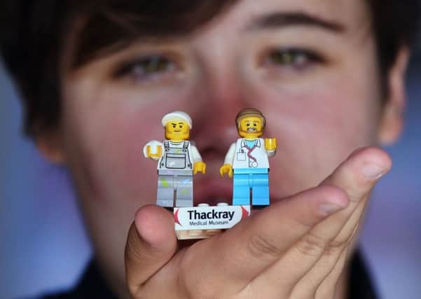 FOUNDATIONS: Lego Build Co-ordinator Katie Clark was one of the first to place a brick. PIC: Jonathan Gawthorpe