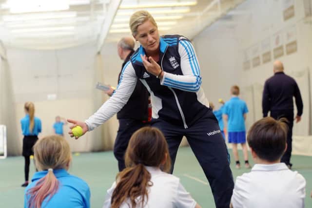 SOUND ADVICE: Katherine Brunt chats to children during a cricket workshop at Headingley in 2015. Picture: Simon Hulme