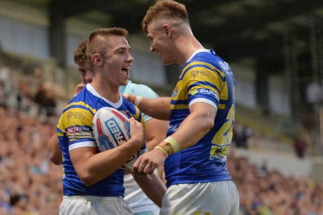 Jack Walker celebrates his try with Ash Handley.