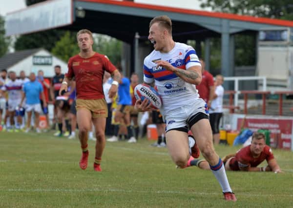 Tom Johnstone runs in for Wakefield's second try.
Wakefield Trinty v Catalan Dragons.  BetFred SuperLeague.  
7 July 2018.  Picture Bruce Rollinson