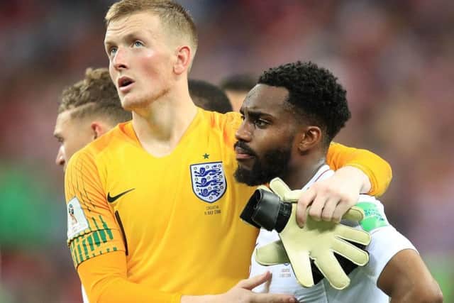 England goalkeeper Jordan Pickford and Danny Rose show their frustration after the World Cup semi-final defeat to Croatia.