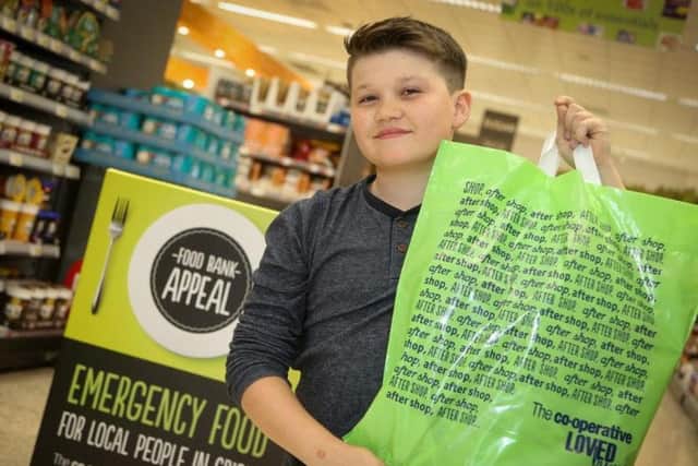 Young shopper Noah Bailey is backing the Central England Co-op Summer Food Bank Appeal