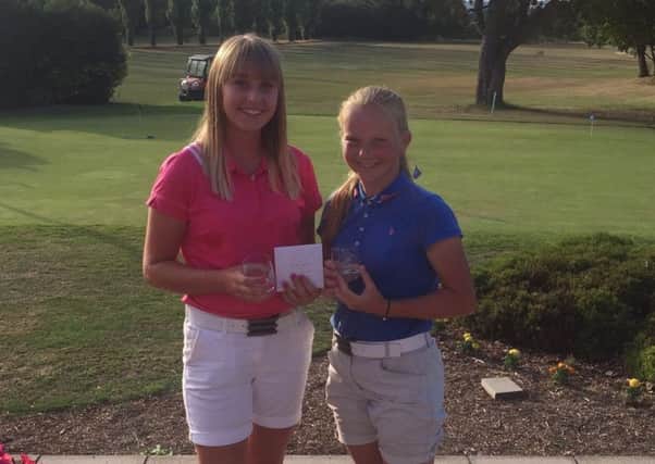 Yorkshire junior champion Nicola Slater, left, with runner-up and her Lindrick club-mate Mia Eales-Smith, after the YLCGA championship at Pontefract.