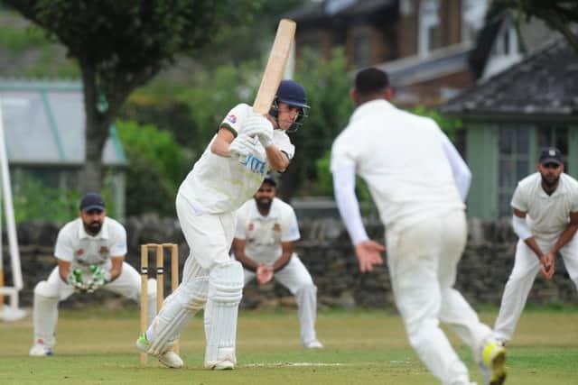 Century-maker: New Farnley opener Simon Lambert on his way to 110 not out against East Bierley.