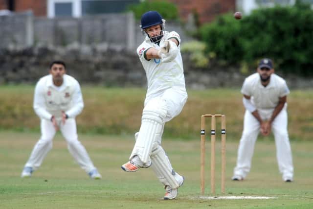 New Farnley batter David Cummings hits four runs against East Bierley as his team stay top of the division.