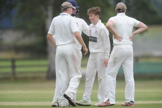 Ben Stokes is congratulated after taking a wicket