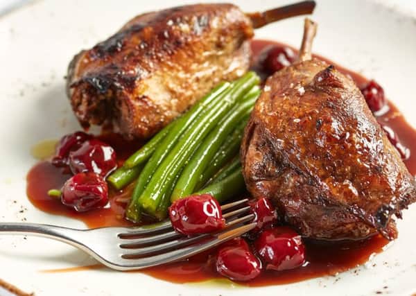 NEW MENU: Crispy duck with cherry sauce and green beans.